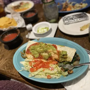 Looks messy but oh so delicious. Veggie burrito.