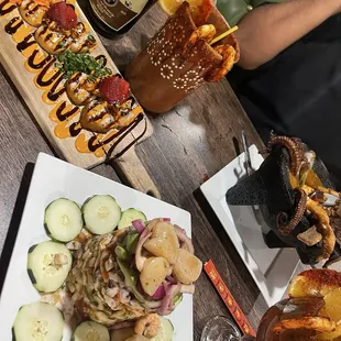 Cantaritos Roll, molcajete de chicharrón de mariscos and torre de mariscos