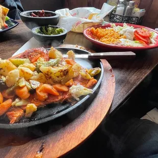 49. Pollo Ranchero - It arrived perfect, pungent, and steaming hot in my face. I know that sounds hilarious, but it had to be written.
