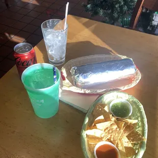 Burrito, chips and drink