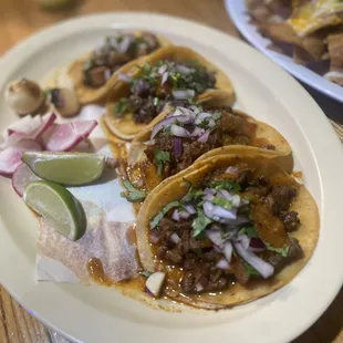 three tacos on a plate