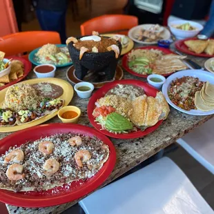 a table full of mexican food