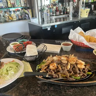 Carboncitos fajitas, chips and salsa.