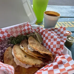 Quesabirria and cucumber Agua Fresca