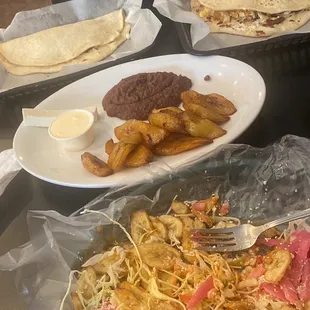 2 baleadas (chicken and beef), plantains, tajadas