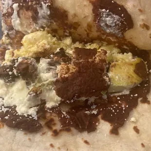 Beef, cheese, egg, beans, avocado baleada