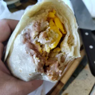 Sausage, egg, cheese, potato, and bean breakfast burrito. Why is it so dry??