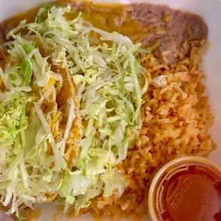 Chicken tacos combo with rice and beans. Delicious comfort food!