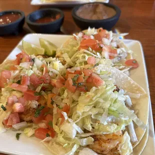 Shrimp tacos forward, fish tacos back.
