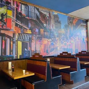 Front dining area with a view of vintage New Orleans Bourbon St.