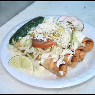 FLAUTAS ORDER OF 4 $8.50 
FLAUTAS W/RICE &amp;BEANS $11.00