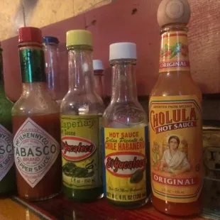 Five kinds of hot sauce, plus an electrical outlet for recharging your Yelping device.