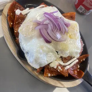 So bomb!! Would recommend this place if you trying to eat some fire chilaquiles! And service was great too !!