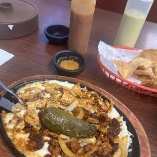 Chicken and chorizo queso fundido.  Also had rice and pinto beans which were both outstanding.  What a hidden gem!