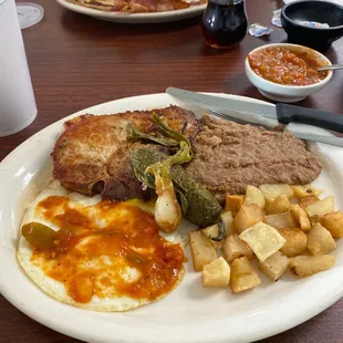 Pork Cops with Eggs Over Medium