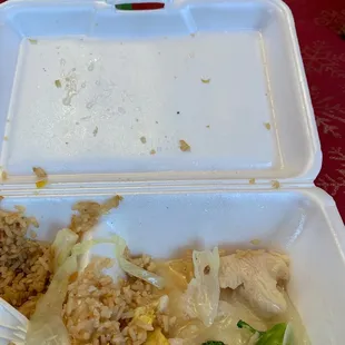 a takeout container with rice, broccoli, and chicken