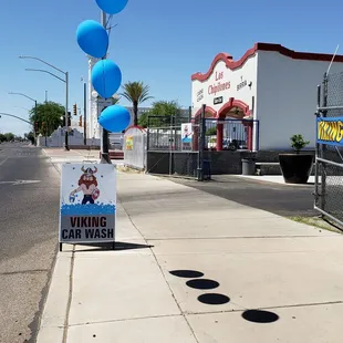a sign for a car wash