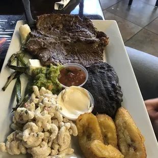 Churrasco! Sweet plantains, guac, queso fresco, mac salad