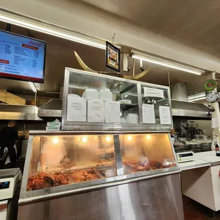 a restaurant kitchen with a television