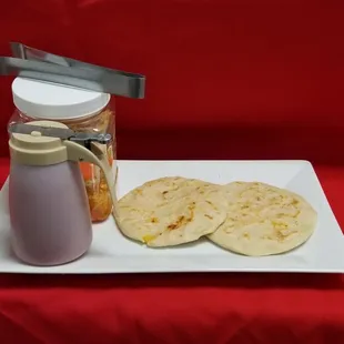 a plate of food and condiments