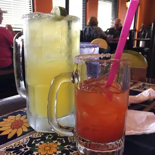 The jumbo margarita next to the regular margarita.