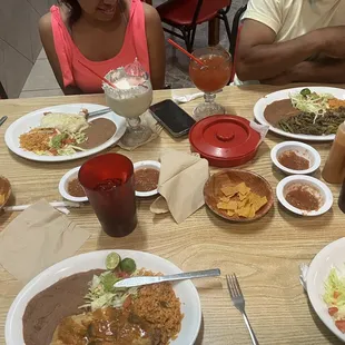 The chicken was raw and the rice and flour tortilla was reheat it. The margarita with sour. and on top of that, the prices went up.