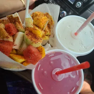 a close up of a fruit salad and a drink