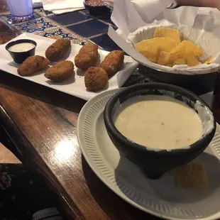 Jalapeño poppers and white Queso.