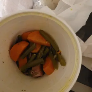 a bowl of carrots and green beans