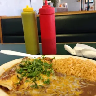 Enchilada special.  $5.50 with rice and beans and a barrel sized sweet tea.   Yum.