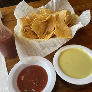Some of the best chips and salsa's around!  That green stuff, whatever it is, is a spicy son of a gun!