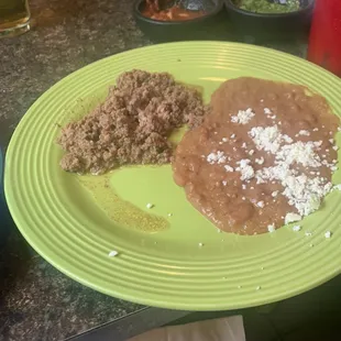 When I told the waitress I was missing the meat on my tostado she brought me this plate Instead of making a new tostada