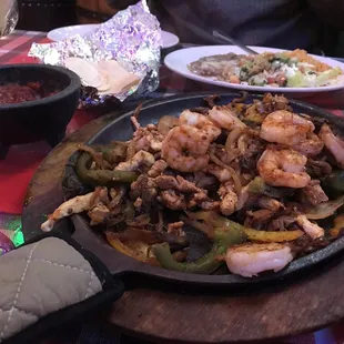 Steak, chicken and shrimp fajitas