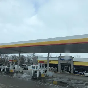 The truck is at this gas station