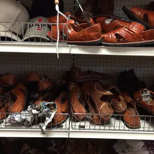 a variety of shoes on shelves