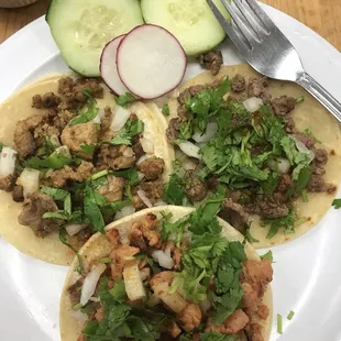 Pastor, chicken, and Carne asada tacos