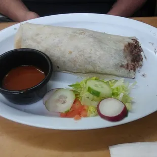 The breakfast burritos with black beans(our choice) Chorizo(our choice), eggs, cheese, potatoes, cilantro and onions &amp; side of spicy salsa.