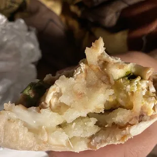 Breakfast burrito with eggs, beans, potatoes, cheese and cilantro!