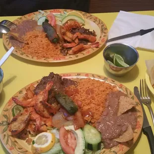 Top:Carne asada con camarones. Bottom:3 carnes; pescado, camarones &amp; Carne asada. VERY GOOD!