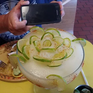 This margarita is like art! Cell phone for perspective! HUGE!!!