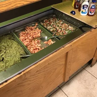 a buffet with a variety of food items