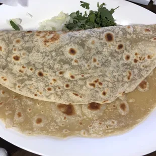 two flatbreads on a plate