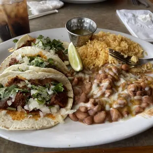 Street tacos Barbacoa, rice and beans.