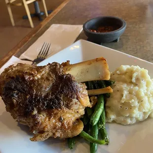 Lamb shank with mashed and green beans