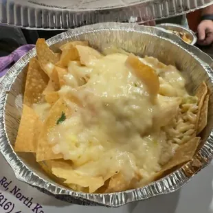 This was their queso. They just melted cheese on the chips. It was disgusting . It had no flavor .