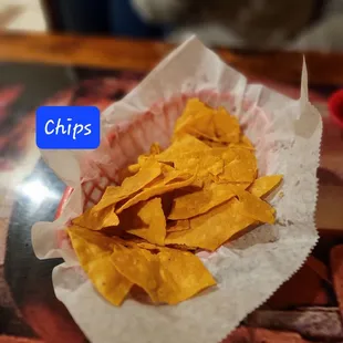 a basket of chips on a table