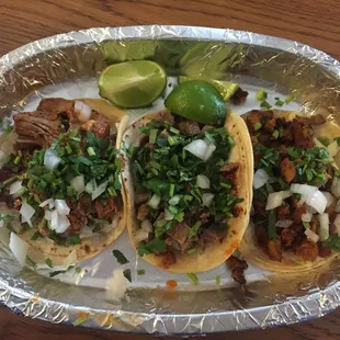 Delicious tacos! From the left: planchata (ironed pressed) birria, planchata lengua, and al pastor.