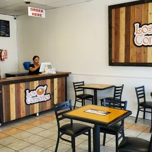a woman sitting at a counter