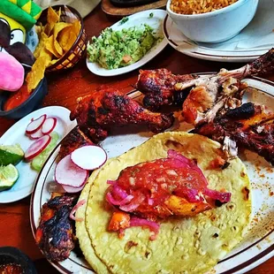 a table full of mexican food