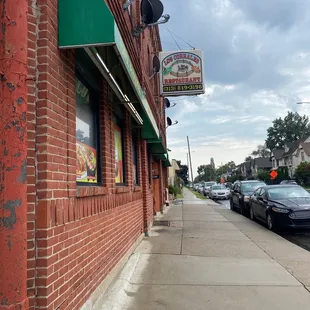 cars parked on the sidewalk